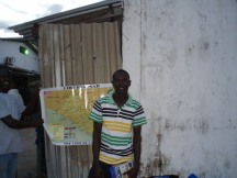 Emmanuel, my running buddy, with map of 'Mama' Liberia